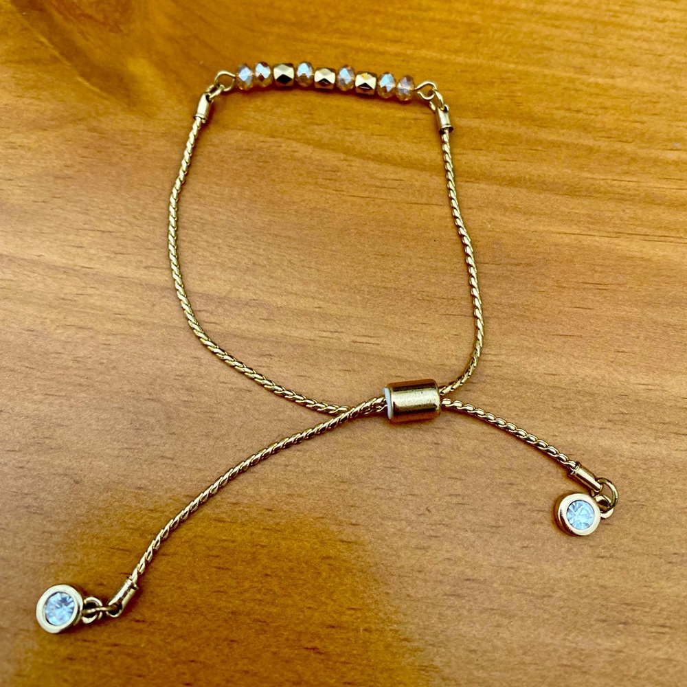 Charming Charlie Gold bracelet w gold and pink beads